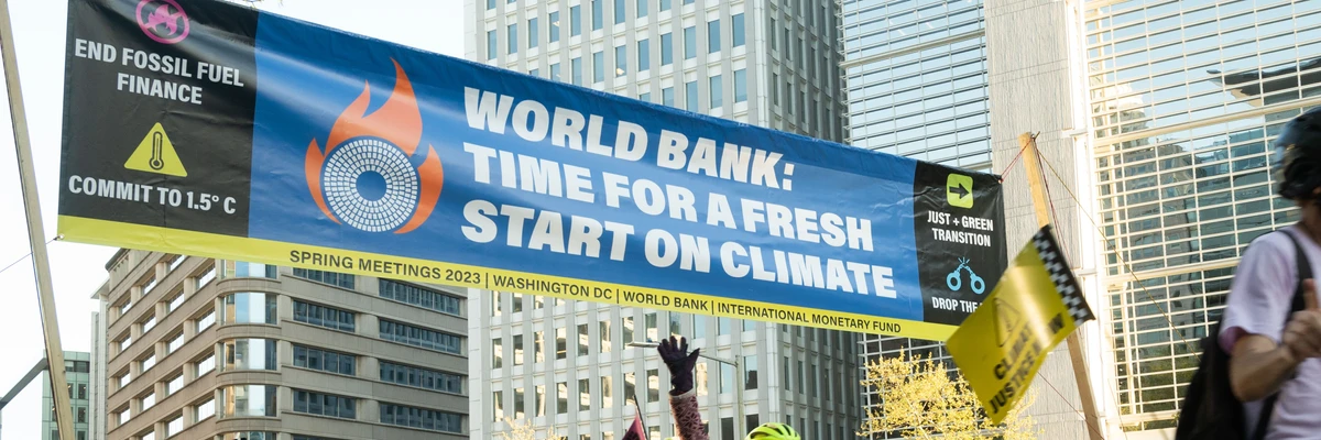 Cyclists take over rush hour traffic outside World Bank headquarters and urge the bank's president to end funding for fossil fuels on April 10, 2023 in Washington, D.C. (Photo: Kevin Wolf/AP Images for Glasgow Actions Team)

