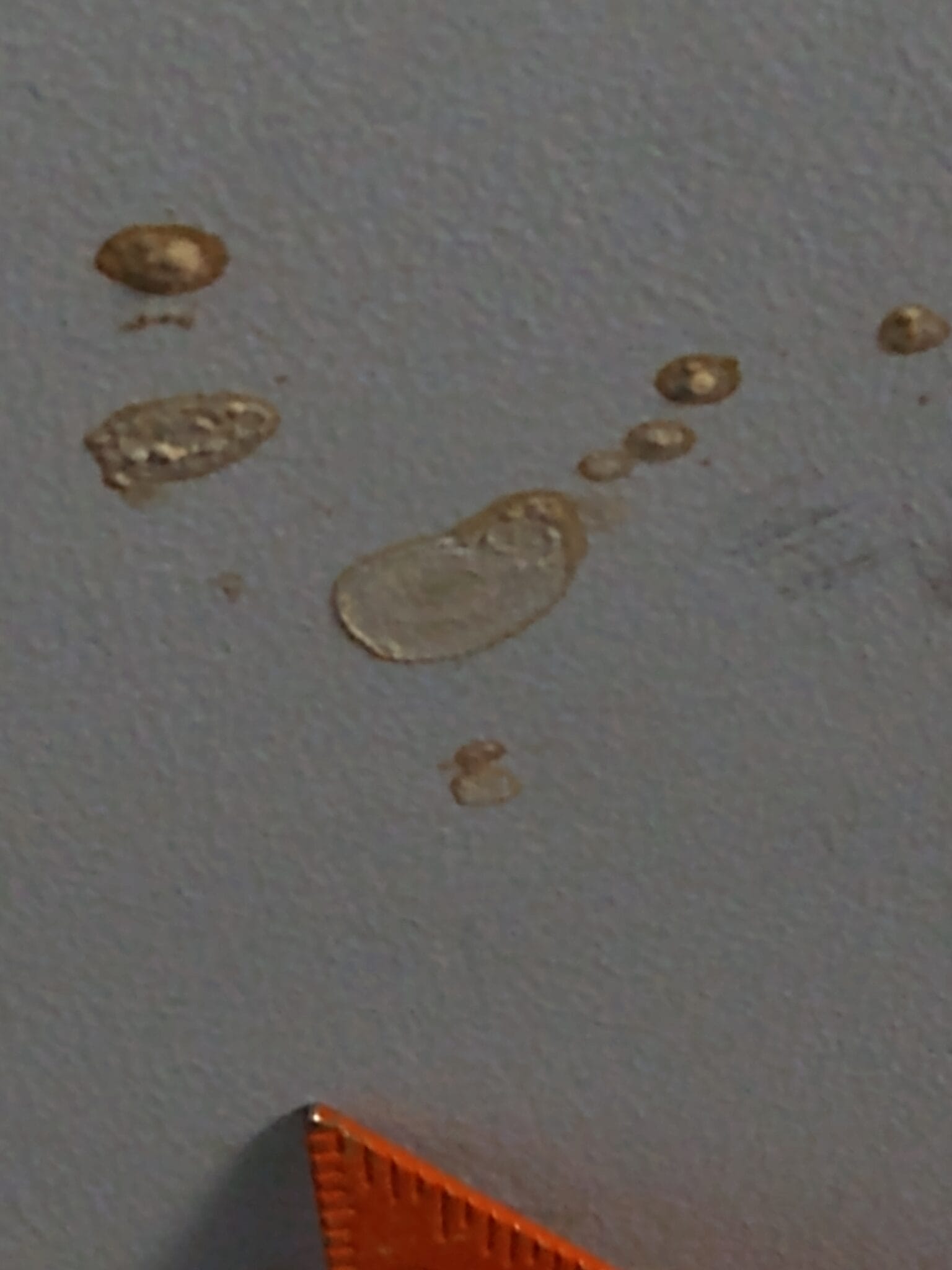 Asbestos stuck to wall